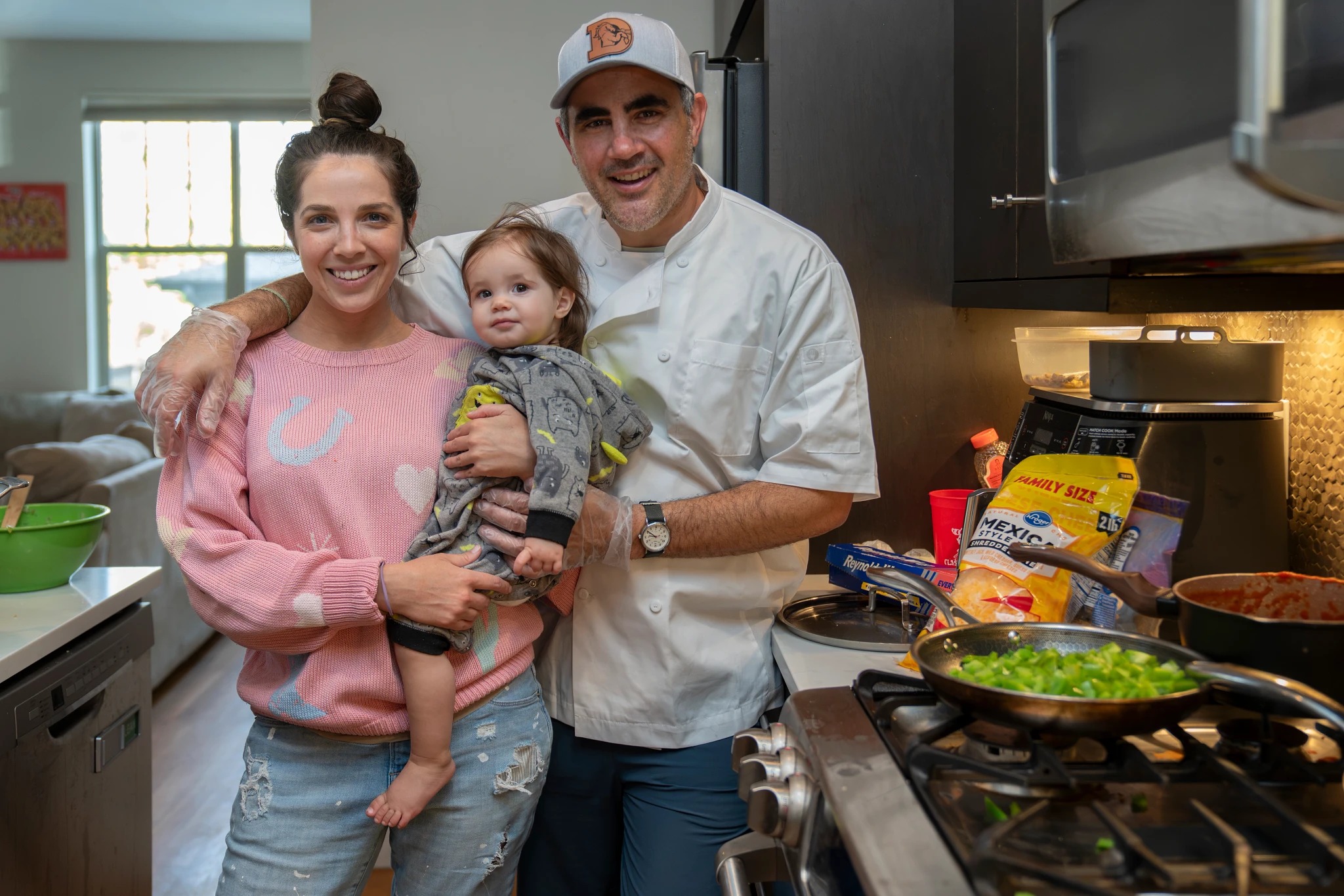 The Philo’s Kitchen family cooking together in the kitchen